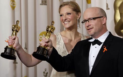 Melbourne-born documentary producer Eva Orner clutches her Oscar after she and director Alex Gibney won for Taxi To The Dark Side.